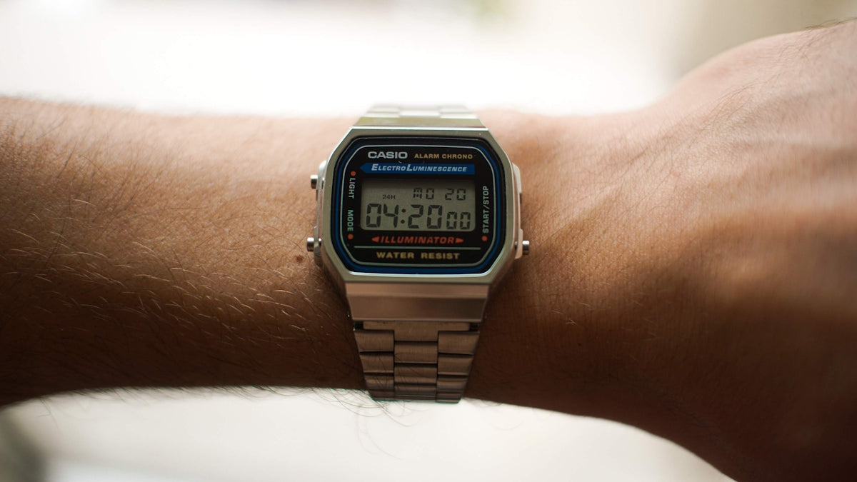 a close up of a person's wrist with a watch on it
