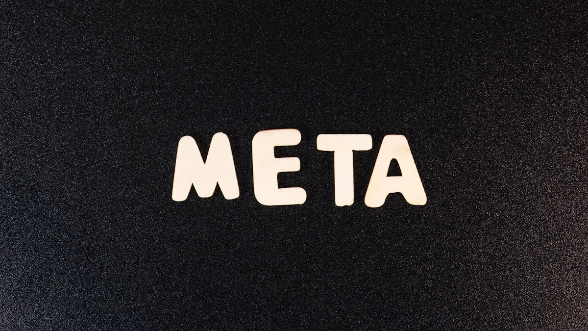 a close up of a black surface with white letters
